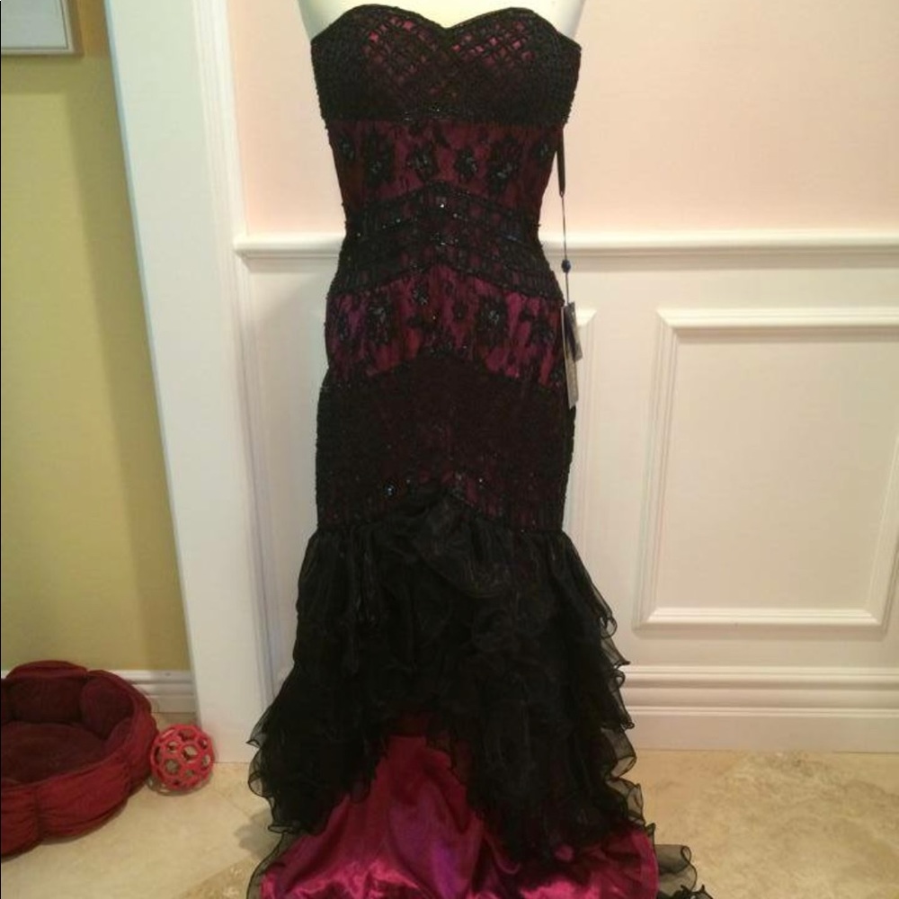 Magenta and black dress size 6. NWT.